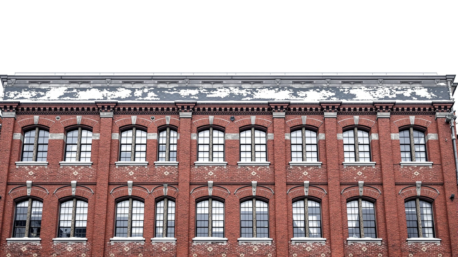 Granite textile mill above a river in Fall River